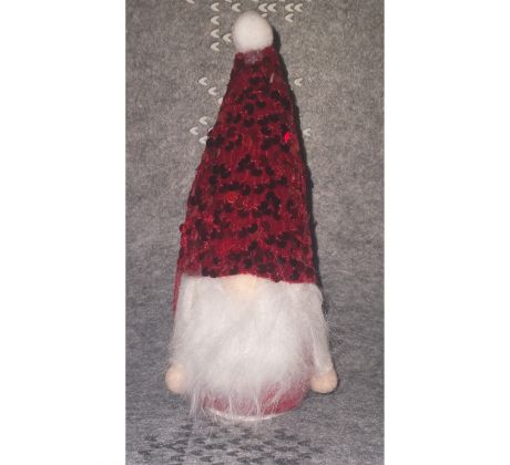 Vianočný škriatok s červenou čiapkou 